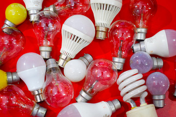Electric Light Bulbs isolated on Red Background