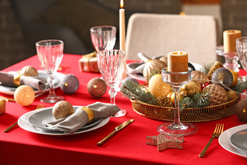 Festive table setting for Christmas dinner at home