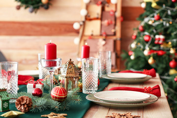 Festive table setting for Christmas dinner at home