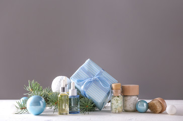 Christmas decor and products for spa treatment on table