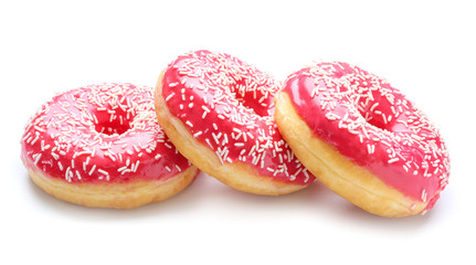 Obraz na płótnie Canvas Sweet tasty donuts on white background