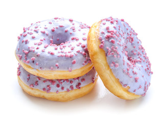 Sweet tasty donuts on white background