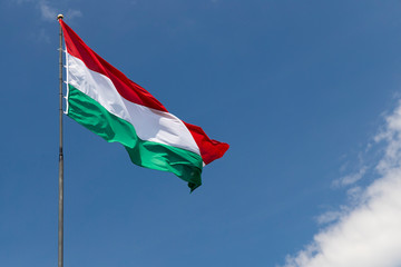 Hungarian flag on blue sky