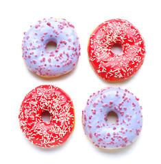 Sweet tasty donuts on white background