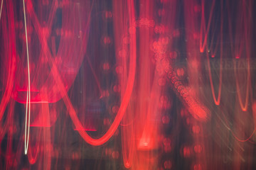 Abstract bright blurred neon trend background, multi-colored lines. Speed light beam night traffic and lights.