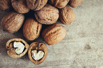 Walnuts on the table close-up. Top view. Copy, empty space for text