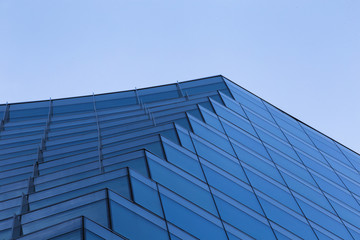 Fototapeta na wymiar Low angle modern blue building design