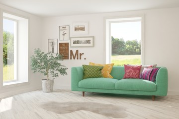 Stylish room in white color with sofa and summer landscape in window. Scandinavian interior design. 3D illustration