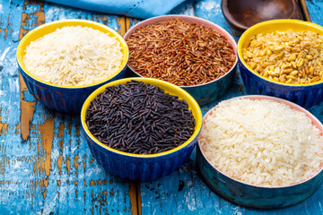 Different types of rice, white basmati, jasmine, arborio, brown and black