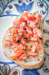 Traditional italian bruschetta with fresh tomatoes