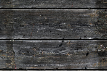 Fototapeta premium old weathered black plank wall background