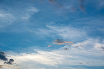 Sunset And a gray cloud with a blue sky