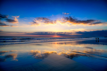 Magic Dramatic Unreal Sunset in Seminyak beach, Bali, Indonesia © segawa7