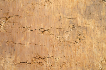 Textured ground and sand surface as background, top view