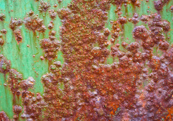 Colorful patterns of rust on the steel floor.