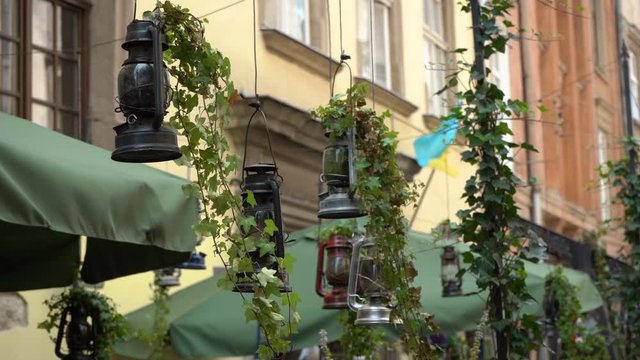 hanging kerosene lamp on the street,swaying old street lamp kerosene, traveling the old streets