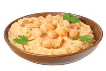 brown bowl with chickpea hummus isolated on white background