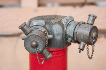 Red fire hydrant on a sidewalk