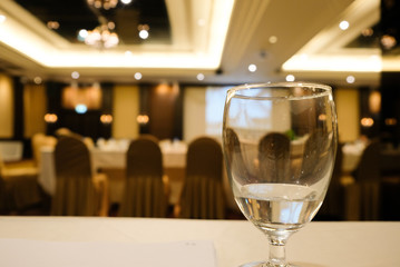 Speaker giving a talk in conference hall at business event.