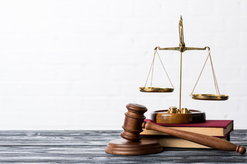 scales of justice and gavel on white background