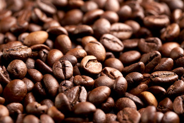 closeup of brown coffee background. texture. whole coffee beans background