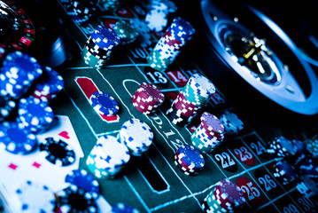 Roulette table and stack of poker chips, Casino, gambling and entertainment concept  photo