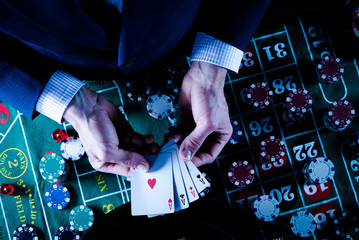 Roulette table and stack of poker chips, Casino, gambling and entertainment concept  photo