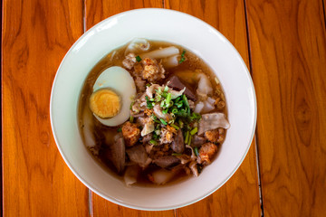 Paste of rice flour in a bowl placed on a wooden table,asian food