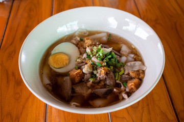 Paste of rice flour in a bowl placed on a wooden table,asian food