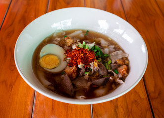 Paste of rice flour in a bowl placed on a wooden table,asian food