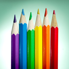 Six colored pencil with colors of the rainbow flag (or pride flag) used to represent both peace and...
