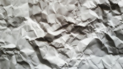 Crumpled paper textures. Black and white colored grunge background. Wrinkled paper texture. Abstract background. 