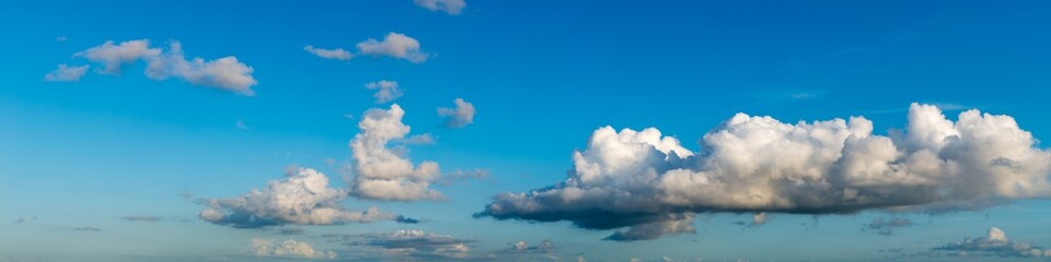 Fantastic soft clouds against blue sky, natural composition - panorama