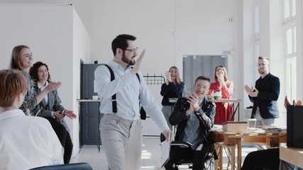 Happy smiling Caucasian manager man entering office celebrating success with team cheering him up slow motion RED EPIC.