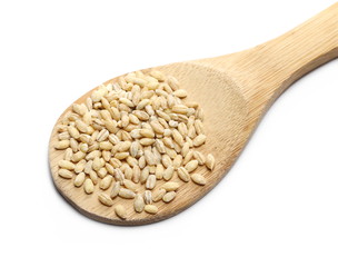 Peeled barley grains isolated on white background