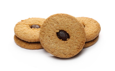 Integral cookies, biscuits with apricot jam filling isolated on white background