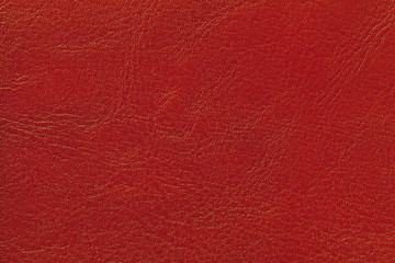 Dark red leather texture background, closeup. Brick cracked backdrop from wrinkle skin.