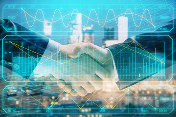 Double exposure of financial chart on cityscape background with two businessmen handshake. Concept of financial analysis and investment opportunities