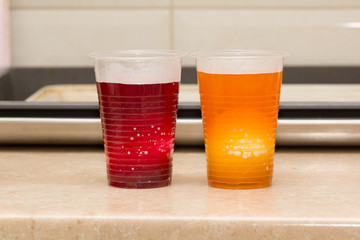 dyeing multicolored easter eggs in coloring solutions