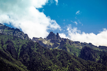 mountain landscape - mountains forest, rocks glaciers snow clouds, Dombay, Karachay-Cherkessia, Russia