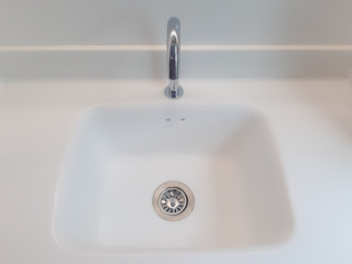 wash basin close-up, basin and tap flowing , white wash basin close up, Bathroom sign toilet, Detail of the basin, working water tap, water flowing from the tap in the sink close-up, Water tap flowing