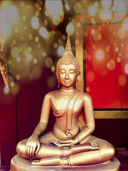 golden buddha statue, The face of gold buddha statue, Close up of the old Thai buddha with wooden...