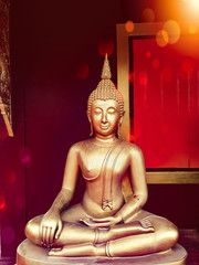 golden buddha statue, The face of gold buddha statue, Close up of the old Thai buddha with wooden wall background in art of religion concept