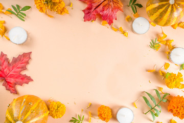 Día de Muertos, mexican day of the dead background, Traditional autumn mexican holiday, with Marigold flowers, candles, autumn leaves and pumpkins. With an inscription  Día de Muertos. Top view flatla