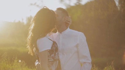 Dancing couple in love at sunset in the Park.