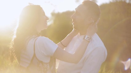 Lifestyle couple having fun and dancing in the Park at sunset.