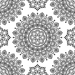 Dot painting monochrome vector seamless pattern with mandalas, Australian ethnic design, Aboriginal dots pattern in black and white background