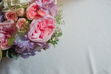 Background with violet,pink peonies on a white background . Pink flower bouquet for text .