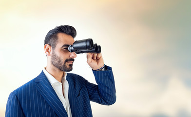 Businessman with binoculars spying، Businessman Hand Holding , looking, watching using Binoculars