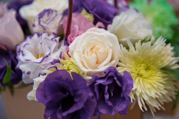 white, purple roses . Purple, white, yellow flowers. Purple, white, yellow flower bouquet .